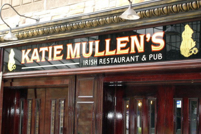 A sign for the katie mullen 's irish restaurant and pub.
