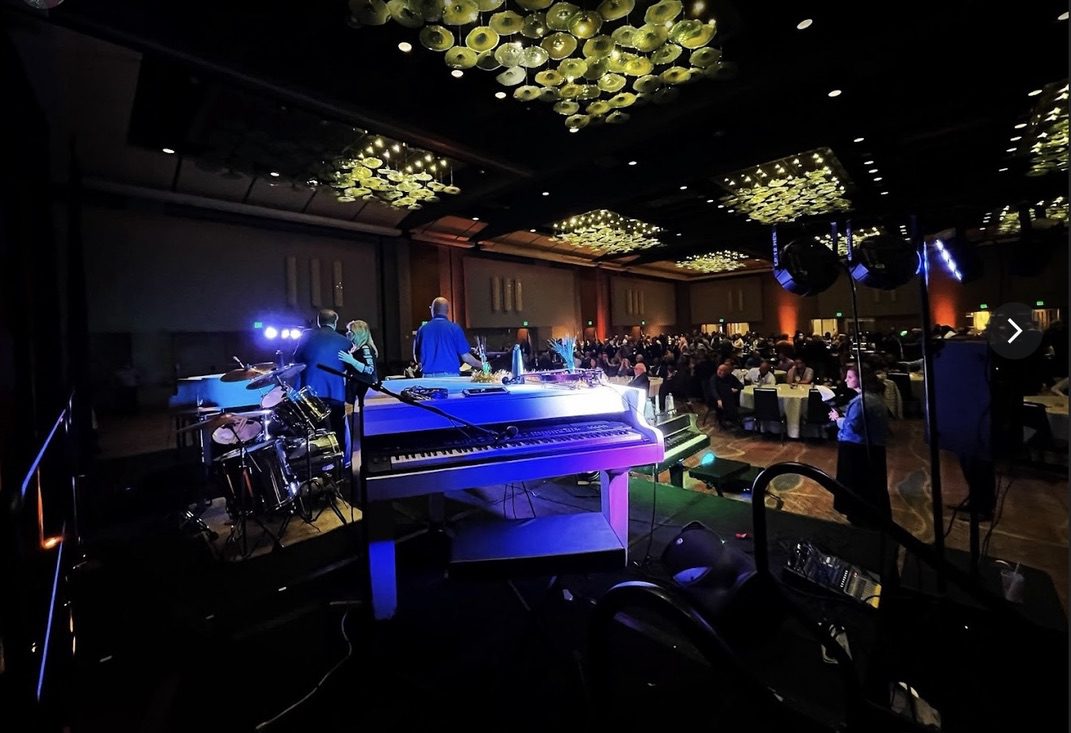 4 Grands 8 Hands entertaining a crowd Hyatt Regency in Denver, CO.